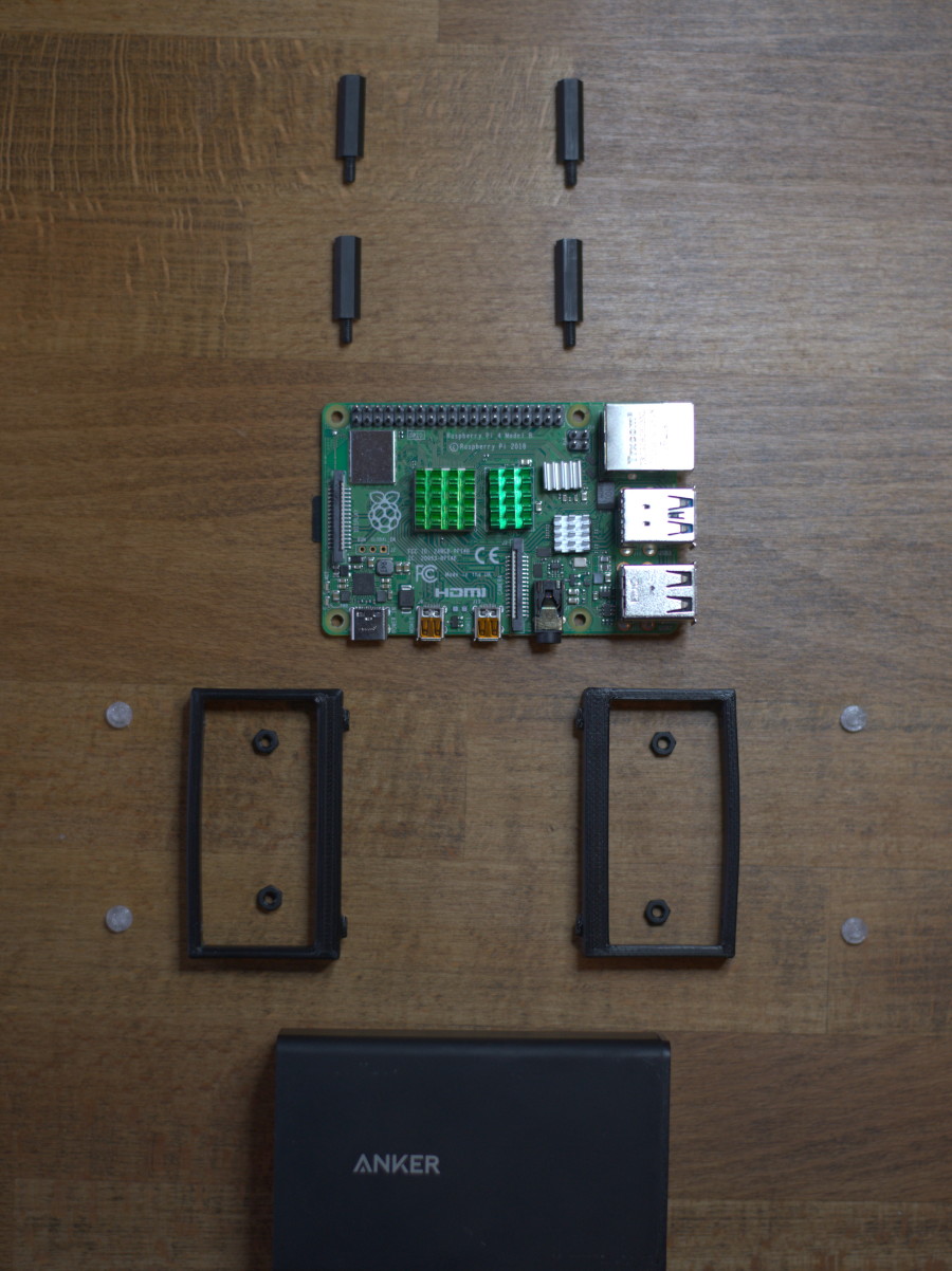 Hardware parts laid out on table